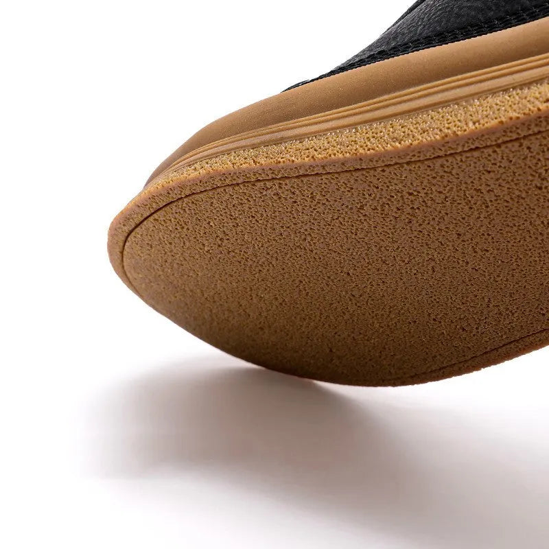 Men's black casual leather shoes with round toe, flat heel, and lace-up closure