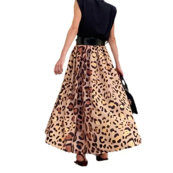 Brown leopard print women's A-line long skirt with a large hemline, shown on a model.