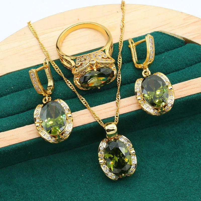 Full rhinestone zircon women's jewellery set with necklace, earrings, and ring on a snake bones chain.