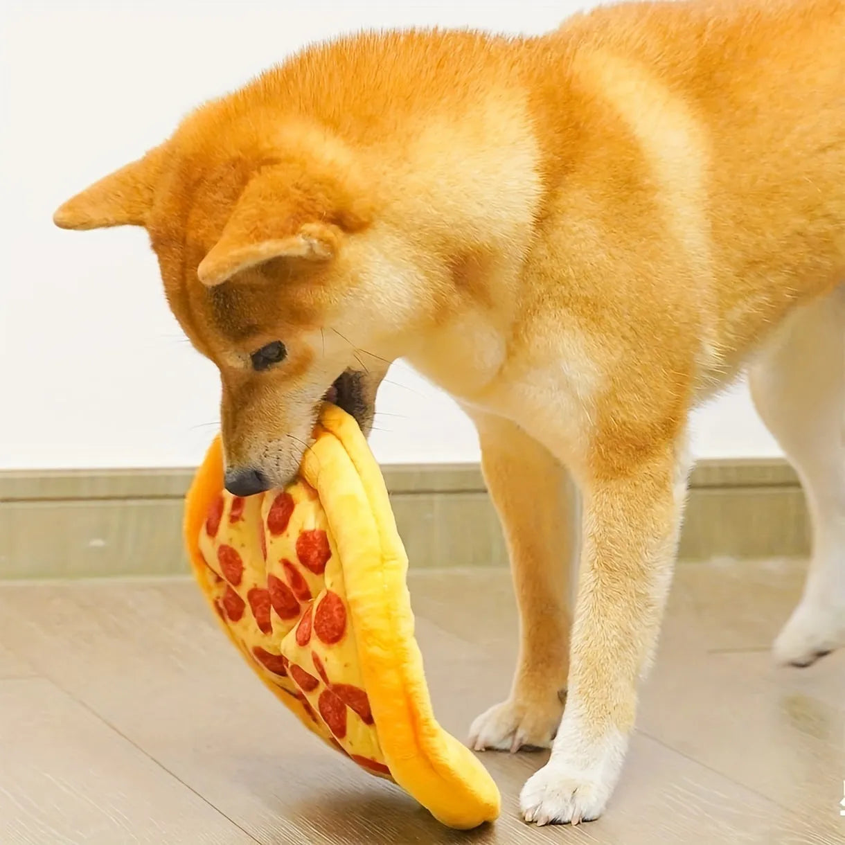 Yellow teddy bear dog toy holding pizza slice squeaky chew toy