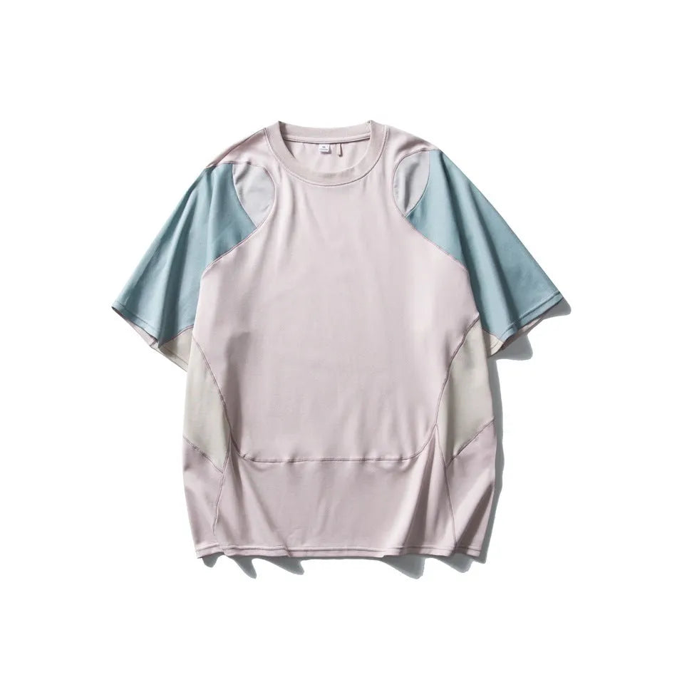 Men's loose blue patchwork t-shirt with raglan short sleeves on a mannequin.