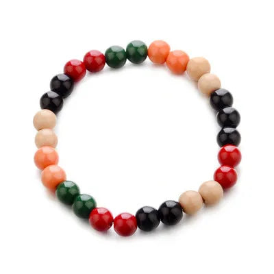 Natural lava stone beaded bracelet with ethnic style on a wrist.