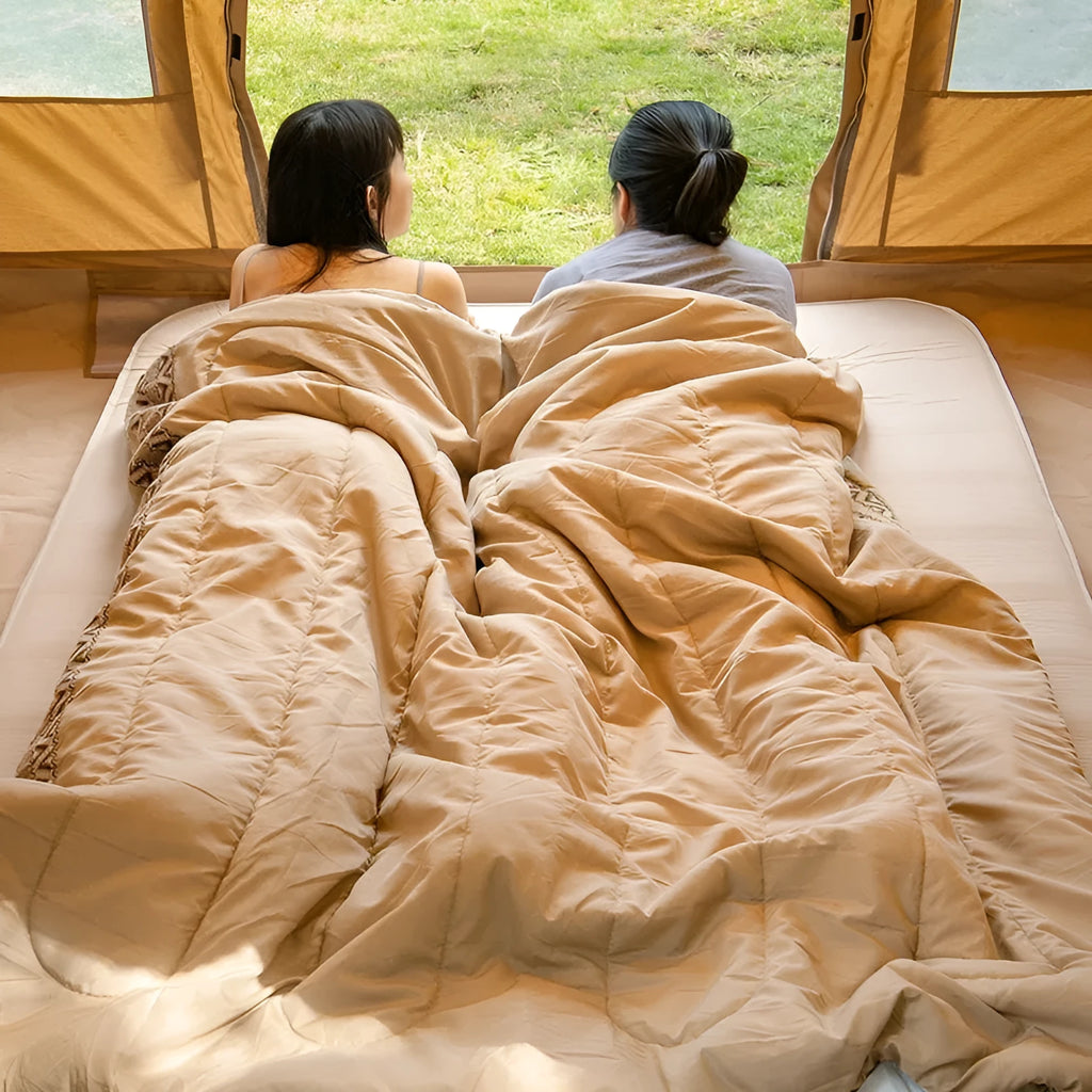 Portable outdoor sleeping bag with storage sack in one of three colour options
