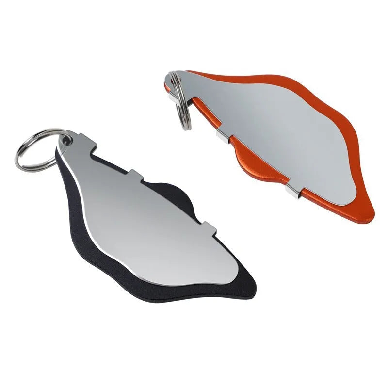Mountain bike disc brake linings with adjustment flap in black and orange colours