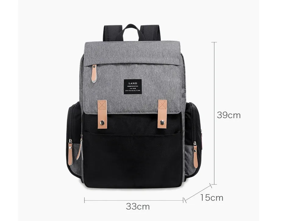 LAND Mommy large oxford cloth diaper backpack with changing mat, shown in grey colour.