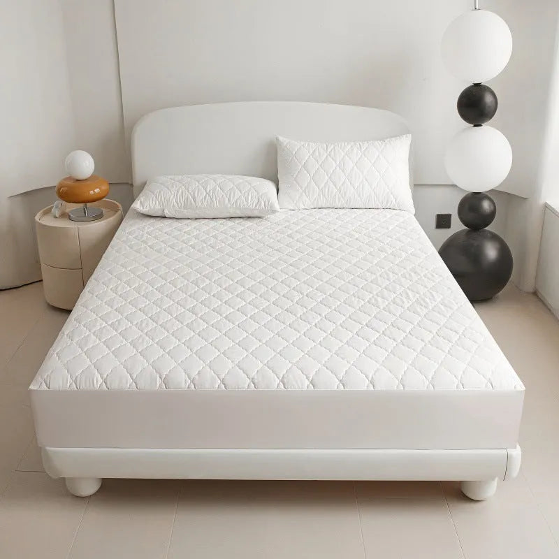 Diamond lattice quilted waterproof mattress protector set with fitted sheet and pillowcases in bamboo fibre