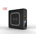 Black and white portable power bank with PD20W fast charging, wireless function, and built-in international plug adapters.