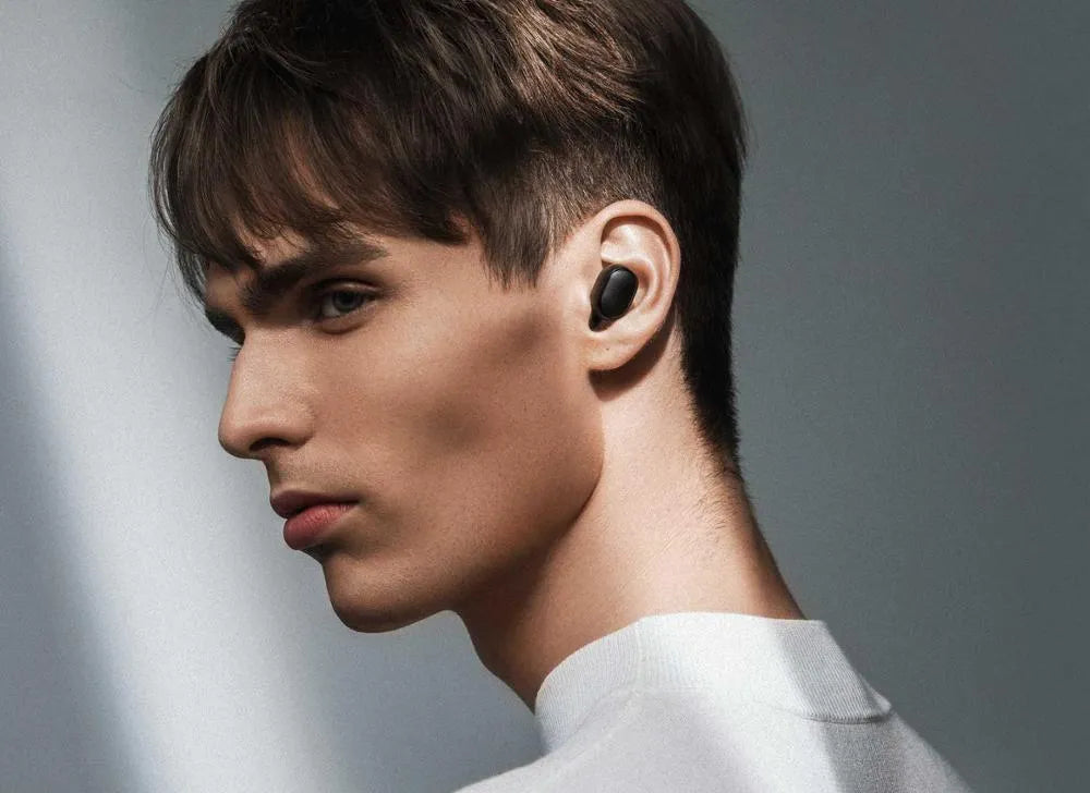 Redmi AirDots 2 true wireless black earbuds with a charging case.