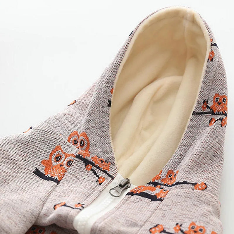Blue cotton dog sweater with front zipper closure shown on small dog