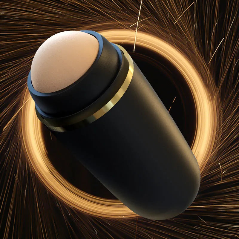 Portable volcanic stone oil absorbing ball in white on light background