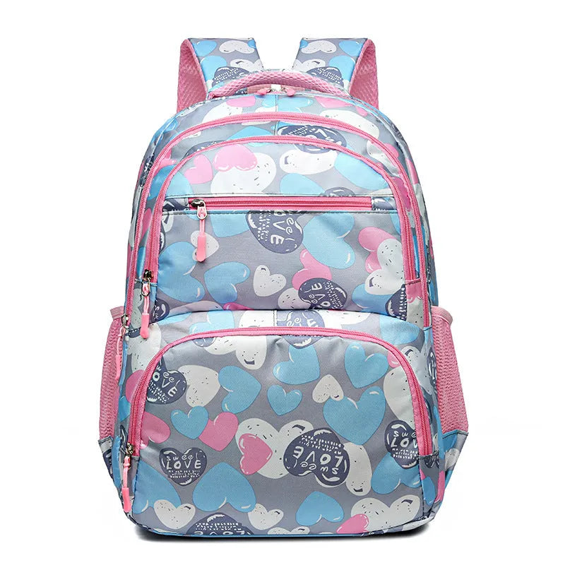 Blue Oxford cloth student backpack with air pillow shoulder straps shown open