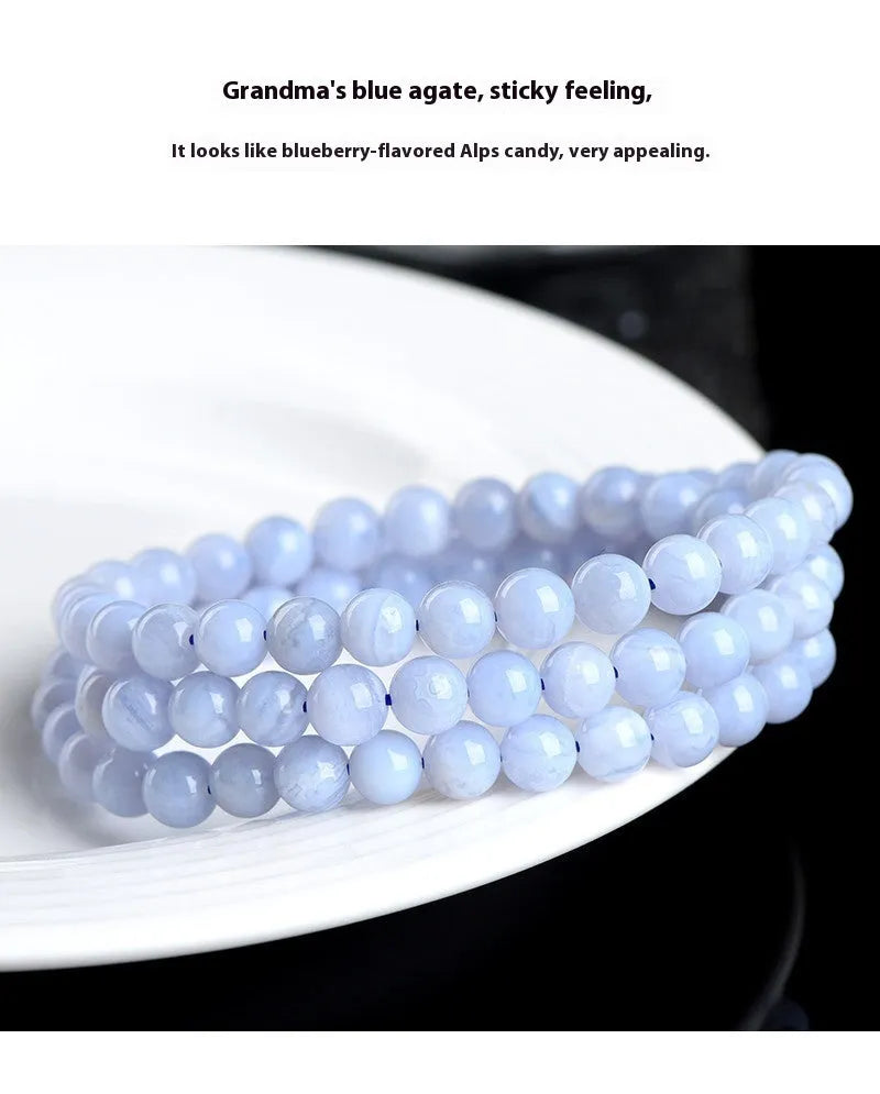 Blue agate bracelet with striped patterns showing 6-6.8mm beads and natural stone colour variations