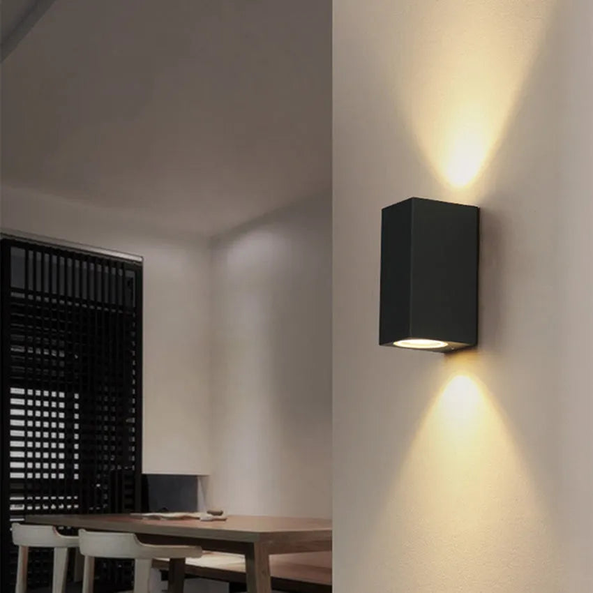 Black aluminium wall lamp with frosted glass shade and LED light source