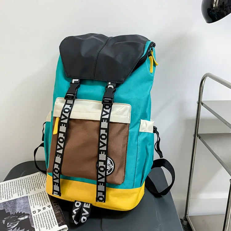 Oxford cloth school backpack showing three carrying methods with 32cm width dimensions