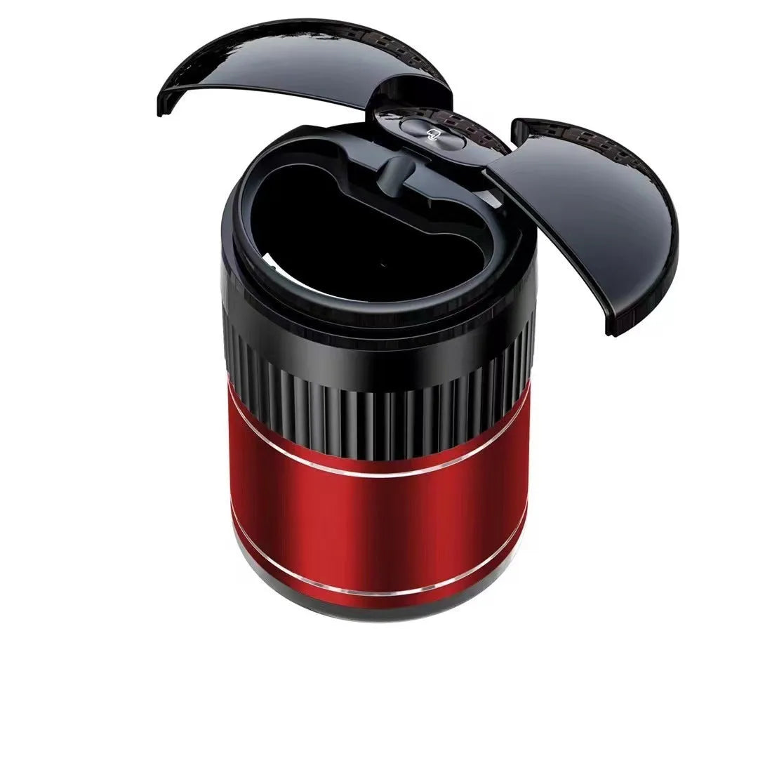 Compact metal car ashtray with lid in black, showing automatic sensor or touch controls.