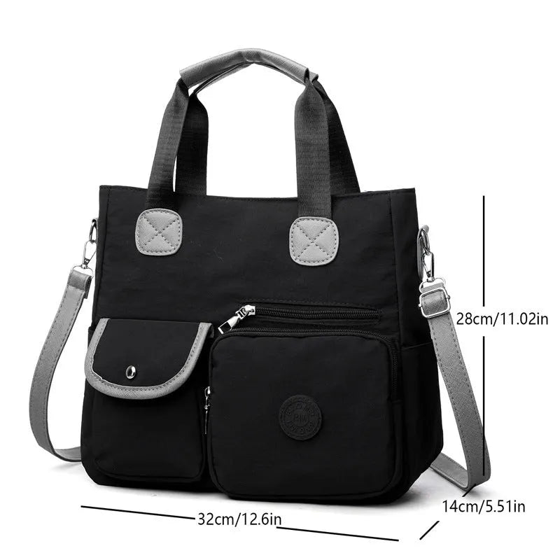 Women's nylon large-capacity crossbody bag in black with organised compartments and single shoulder strap