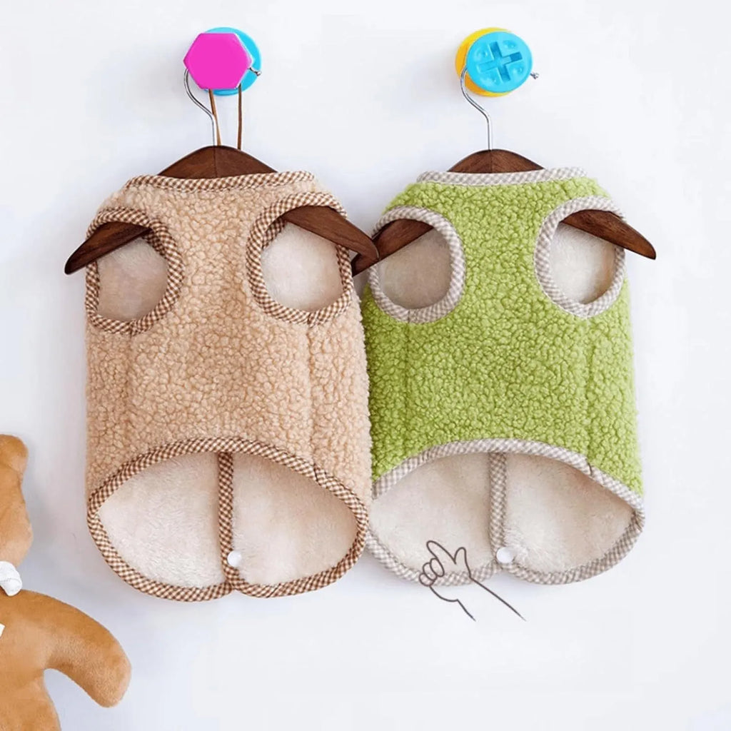 Green coral fleece dog vest with a metal leash ring on the back for a small dog.
