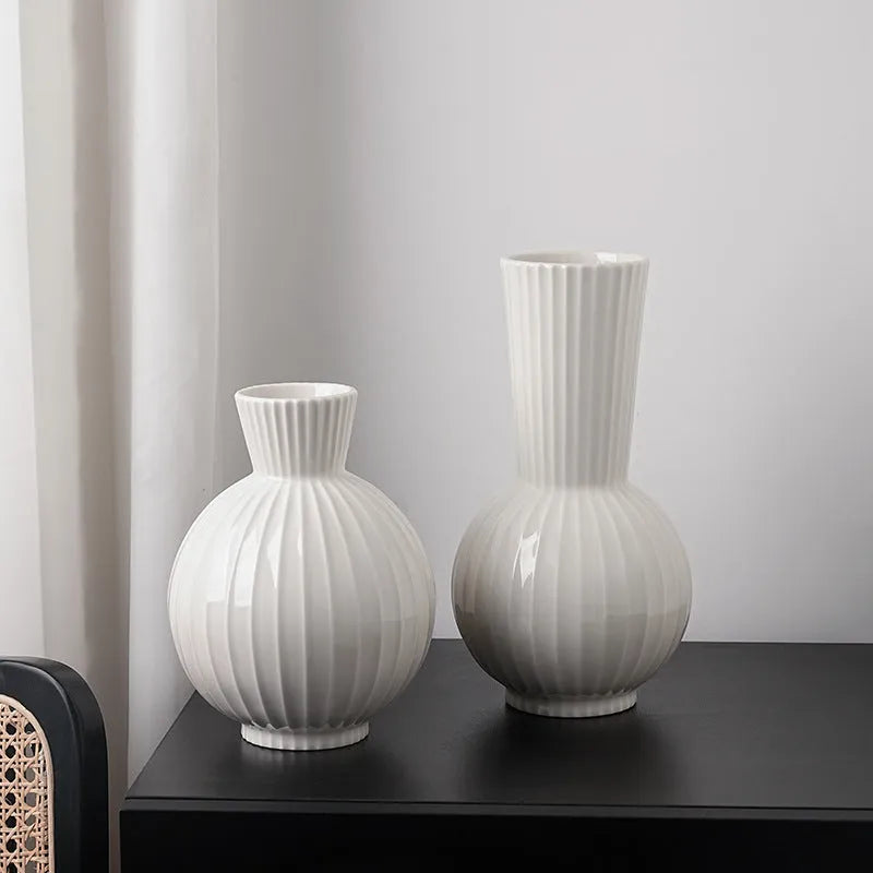 White American country style ball striped ceramic vase with orchid arrangement