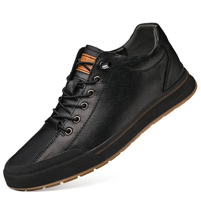 Men's white matte leather casual shoes with flat heel and round toe on a solid background.