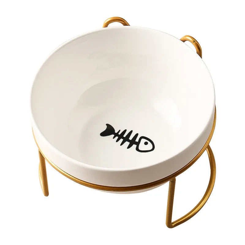 White ceramic cat bowl with decorative pattern and black iron frame support
