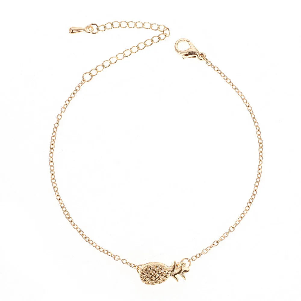 Alloy pineapple charm bracelet for women in gold or silver colour from XINGX series.