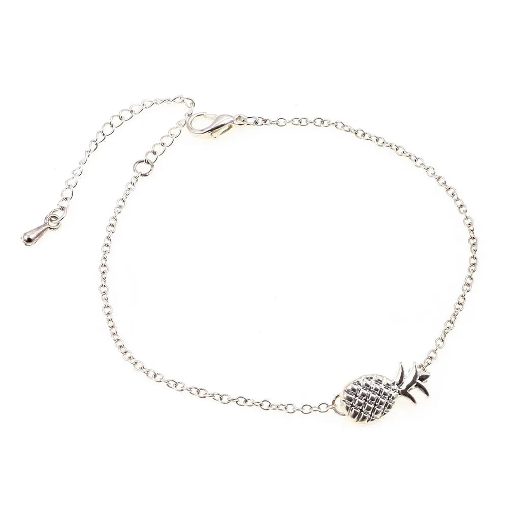 Alloy pineapple charm bracelet for women in gold or silver colour from XINGX series.