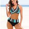 Ladies striped tie-dye hollow bikini set with high-waisted briefs on a mannequin.
