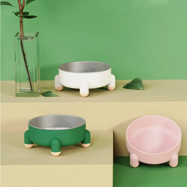 Green stainless steel pet bowl with a high-foot and non-slip base for dogs and cats.