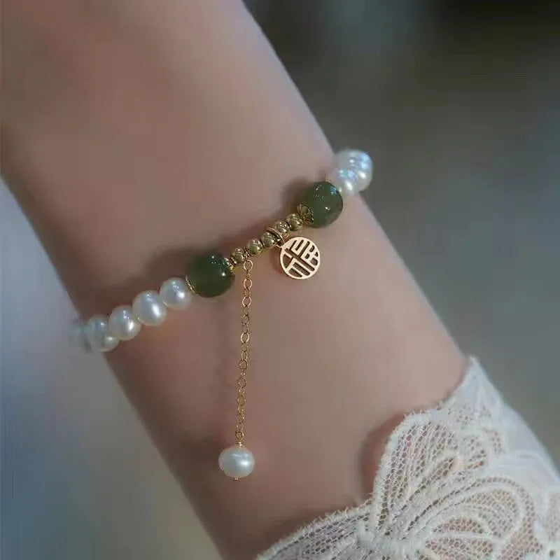 Chinese style bamboo leaf glass bracelet for women with a bamboo joint design.