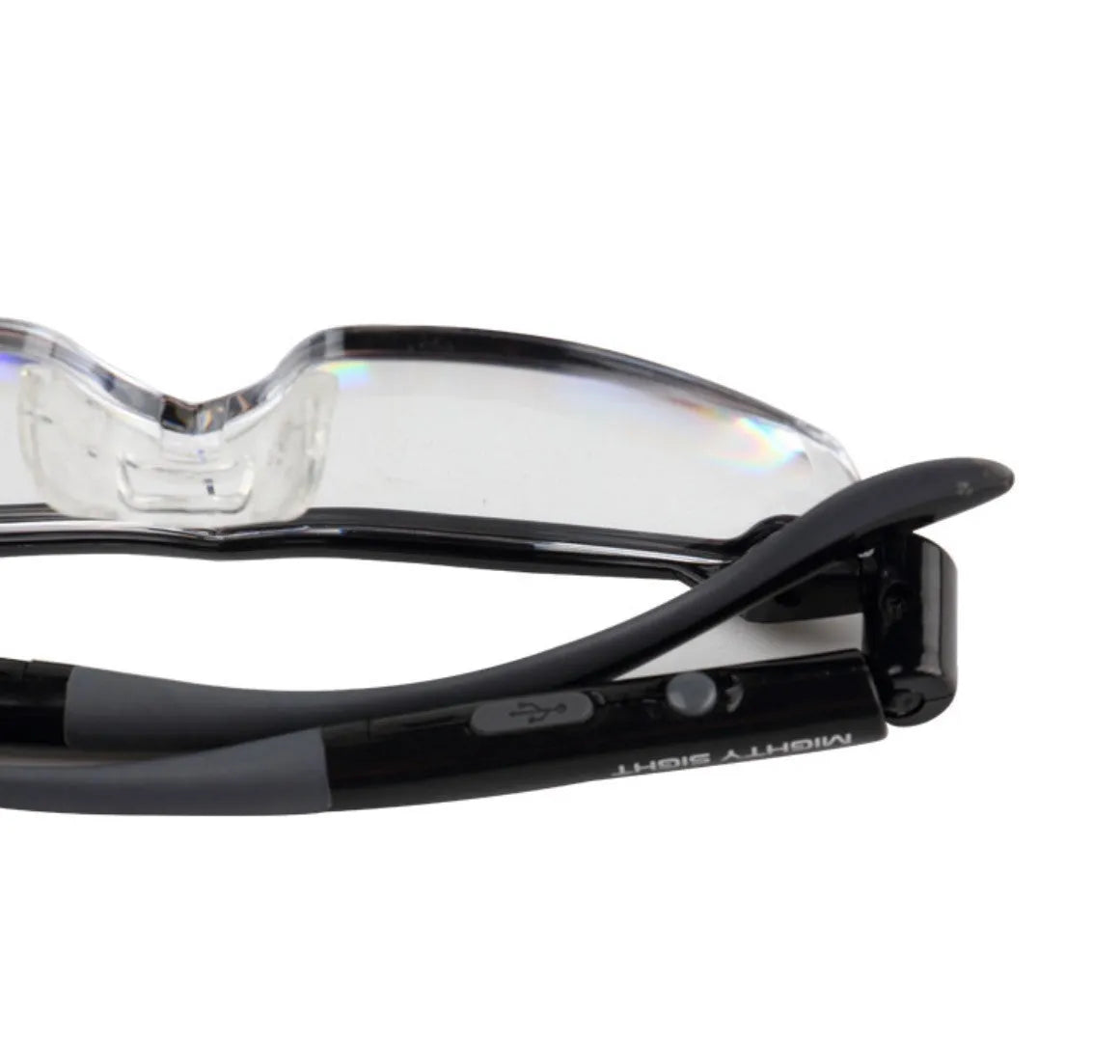 Transparent black USB LED light reading glasses with scheduled timer feature on a desk.