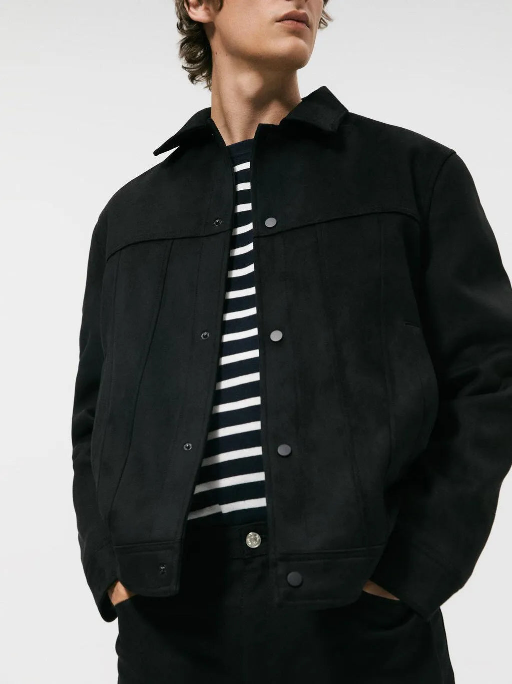 Black men's hooded jacket with suede collar, loose sleeves, and side pockets