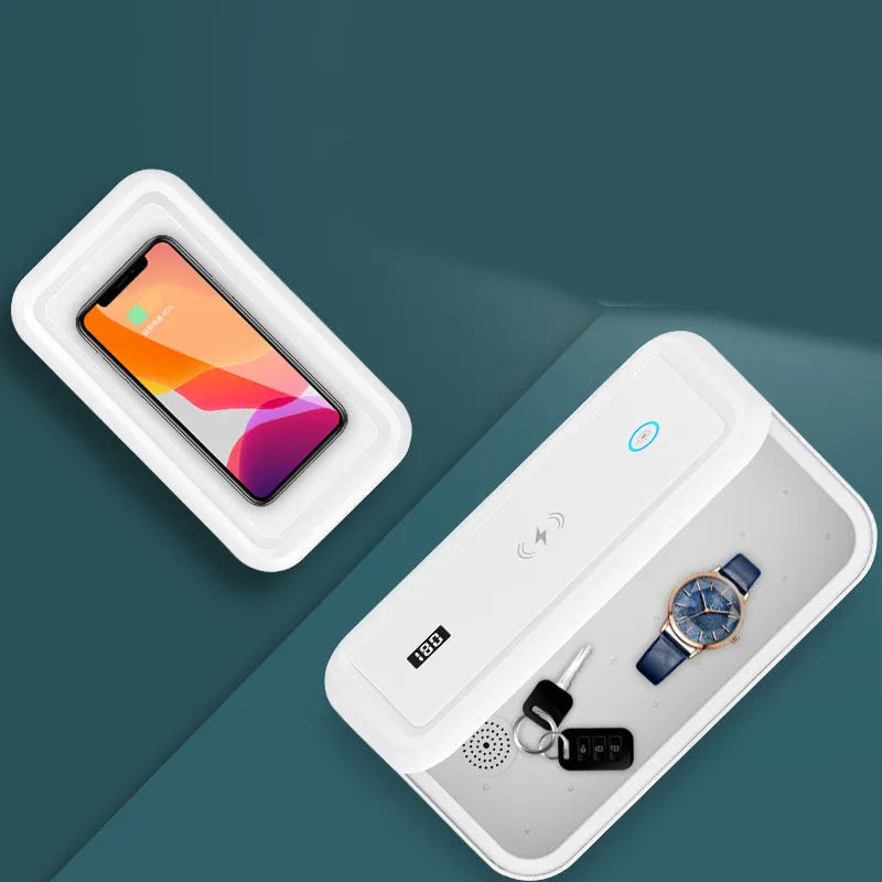 White cell phone disinfection box with USB cable, mechanical timer dial, and slot for smartphone insertion
