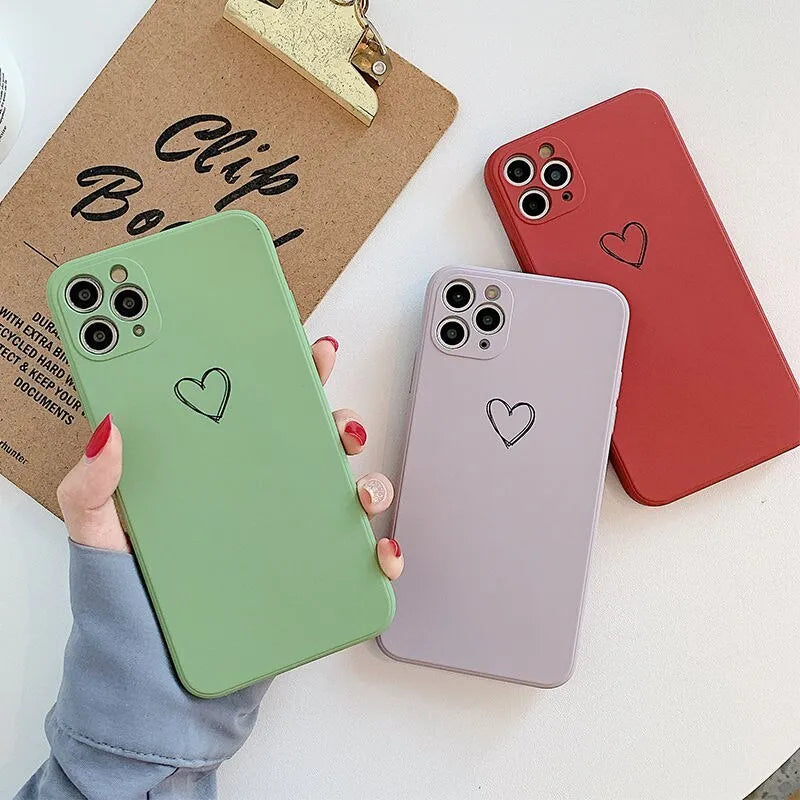 Silicone TPU phone case for Apple iPhone in solid colour options: black, green, grey, light green, pink, purple, red, white.