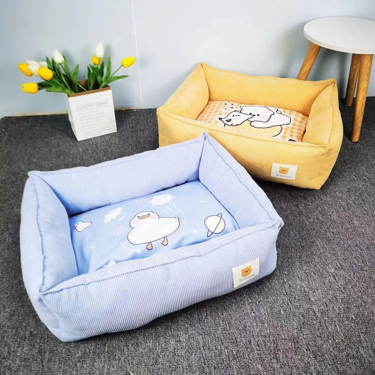 Cotton fabric dog nest in light blue, filled with PP cotton, shown in a 50x40cm size.