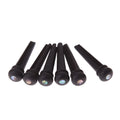 Six matt black ebony folk guitar bridge pins with 5.3mm bayonet diameter on a plain background.