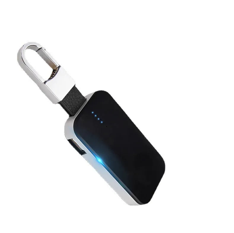 Black Apple Watch wireless charging power bank on a keyring