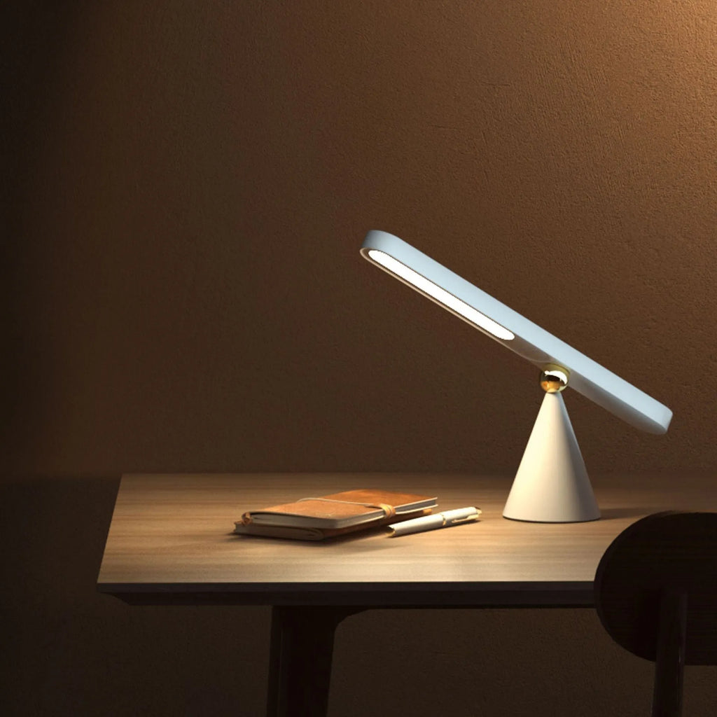 Geometric design desk lamp with magnetic suction base and touch controls in white colour