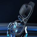 Black head-mounted smart Bluetooth glasses with a built-in camera for video recording on a table with accessories.