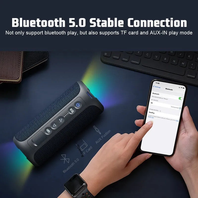 Black and blue fabric wireless Bluetooth speaker with LED lighting showing 40W power rating