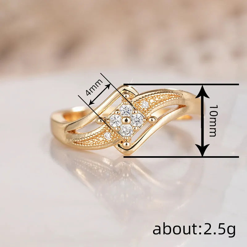 Yellow gold coloured copper diamond ring with micro inlaid zircon detail and geometric quadrangle design.