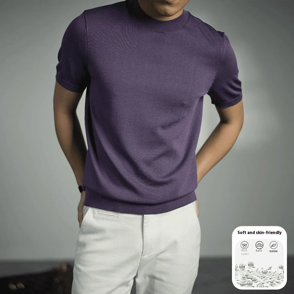 Man wearing a solid colour knitted business t-shirt with round neck and short sleeves.