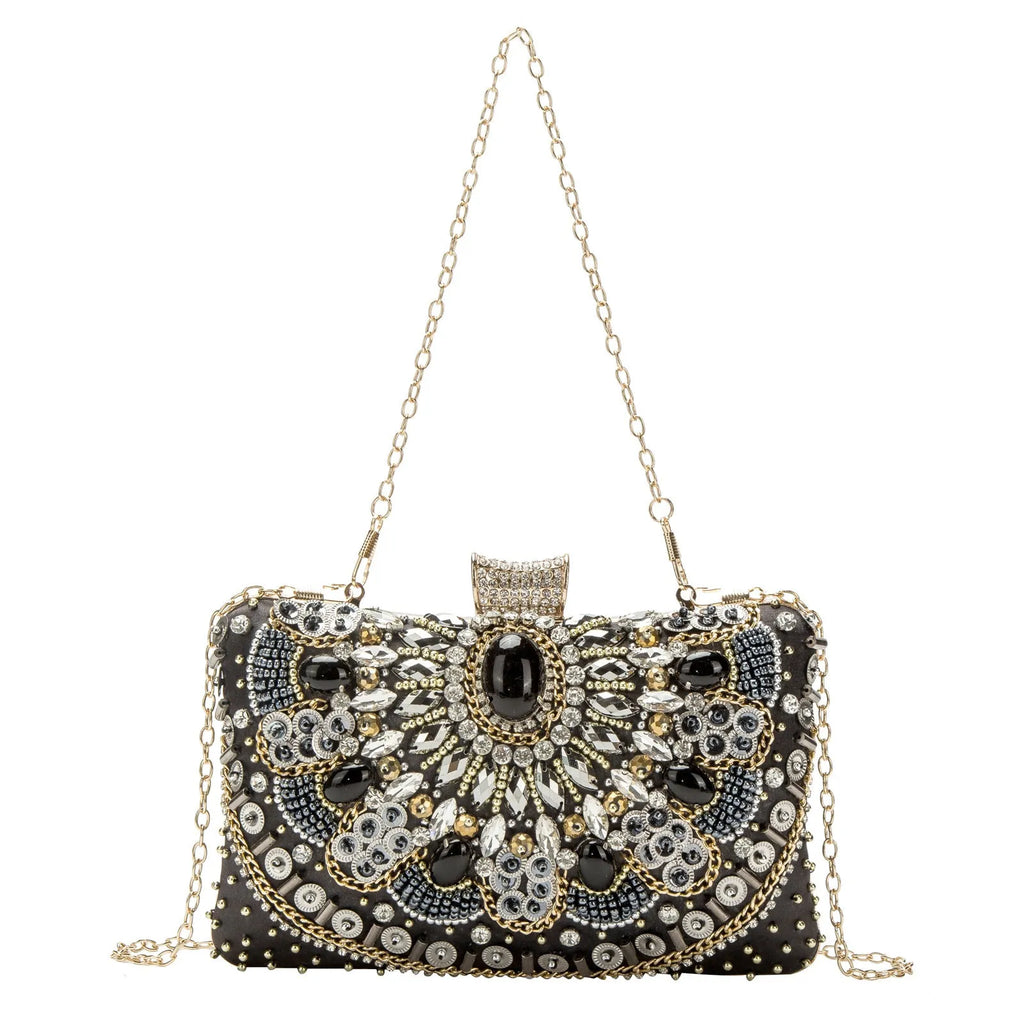 Retro hard shell dinner bag with pearl embroidery and beading in white, showing three-dimensional pocket and hand-held design