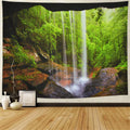 Large bohemian wall tapestry with forest and mandala design hung on a wall
