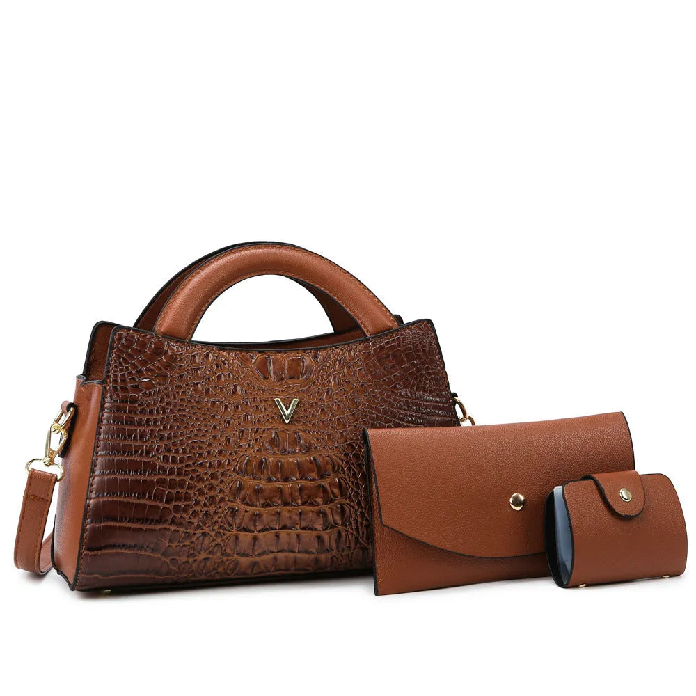 Women's square black crocodile pattern PU leather crossbody handbag with a single strap and outer pockets.