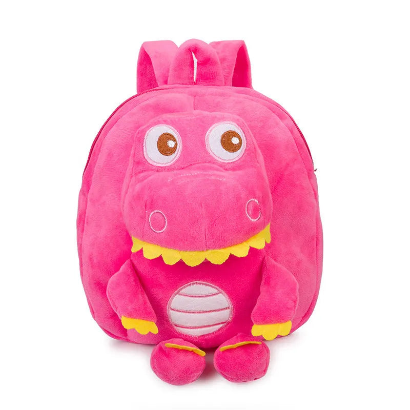 Soft blue dinosaur plush backpack for children with embroidered details and a soft handle.