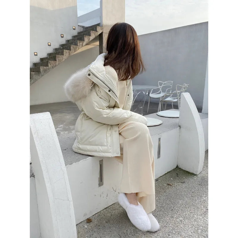 Women's high waist knitted wide-leg trousers in cream white colour with dropped mopping style