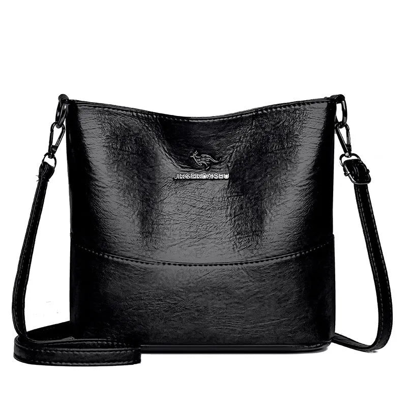 Women's soft leather large capacity shoulder bag in bucket shape with minimalist luxury styling