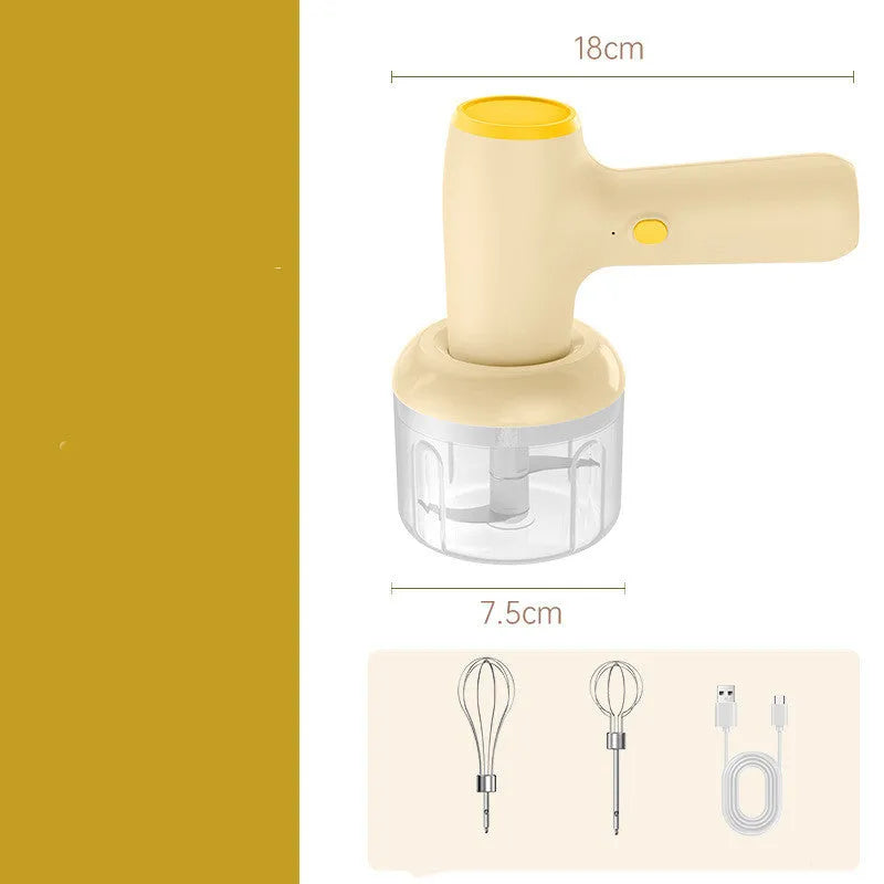 Beige electric garlic chopper with USB charging cable, 250ml cup, and stainless steel blade on kitchen counter
