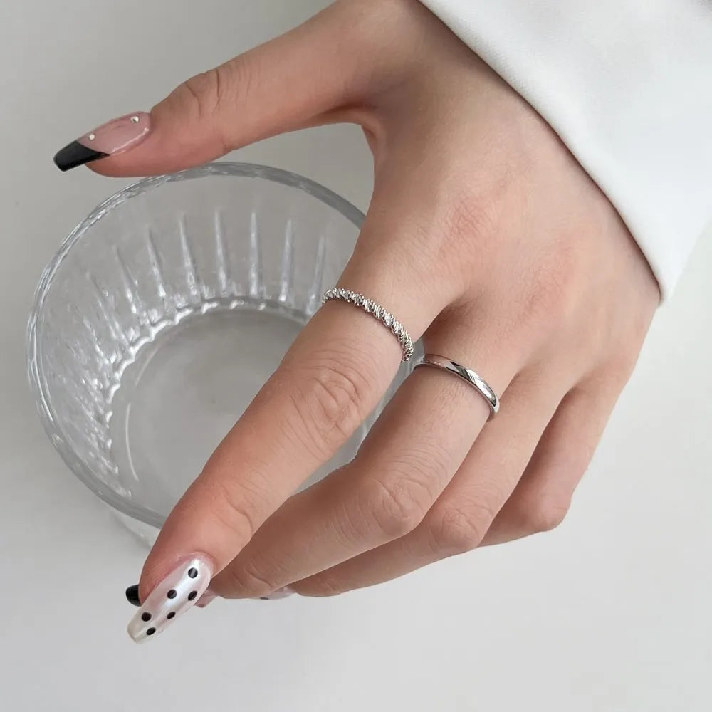 S925 sterling silver geometric twist ring with hexagon and octagon design, white gold colour, side view