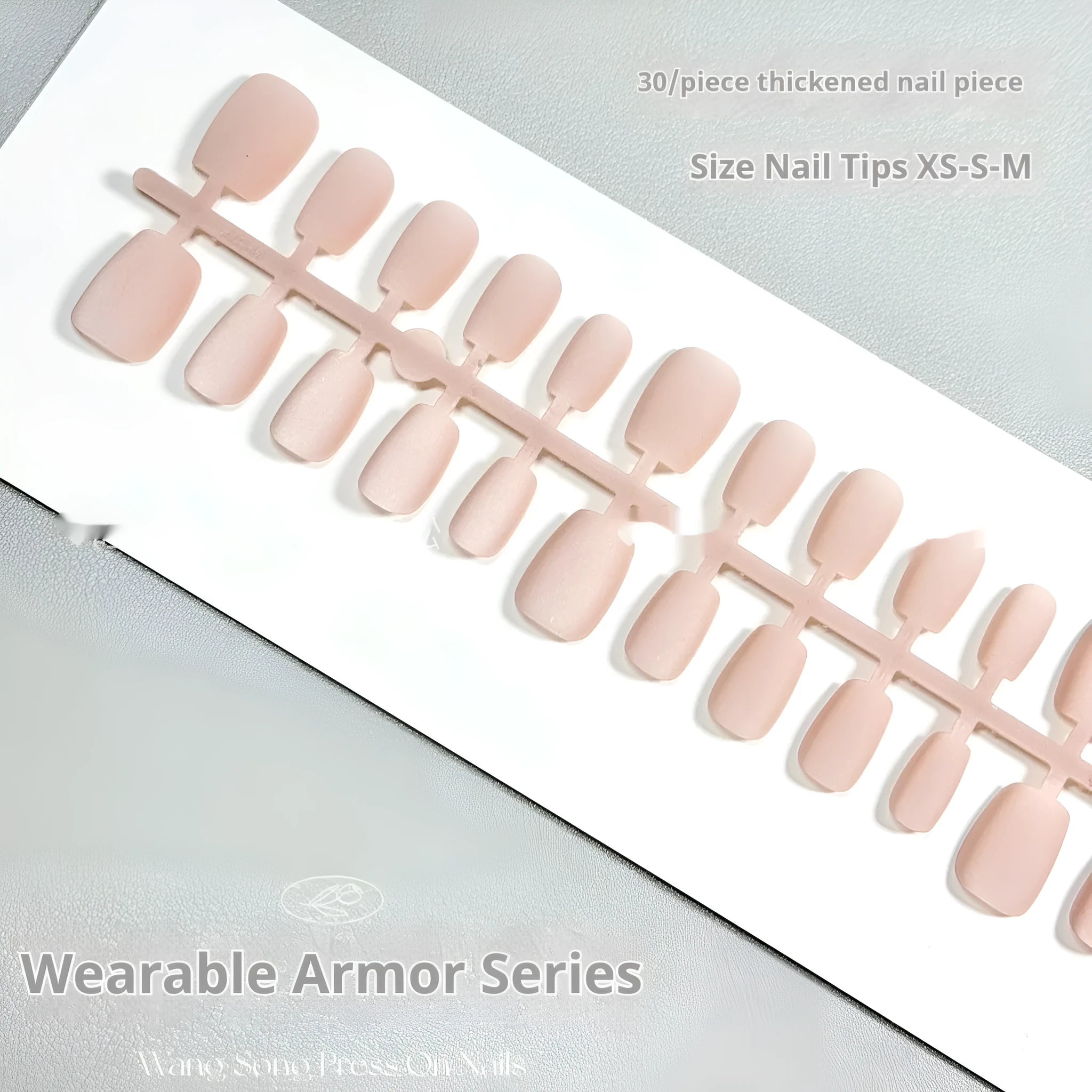 Set of frosted velvet Cat's Eye effect press-on artificial nails in short ladder shapes on a clear background.